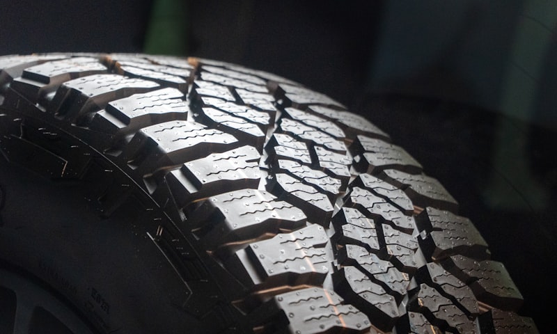 Close-up of tire tread showing tread depth and groove patterns